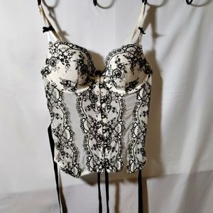 Vintage Victoria Secret corset. Metal clasps bead and lace detail.